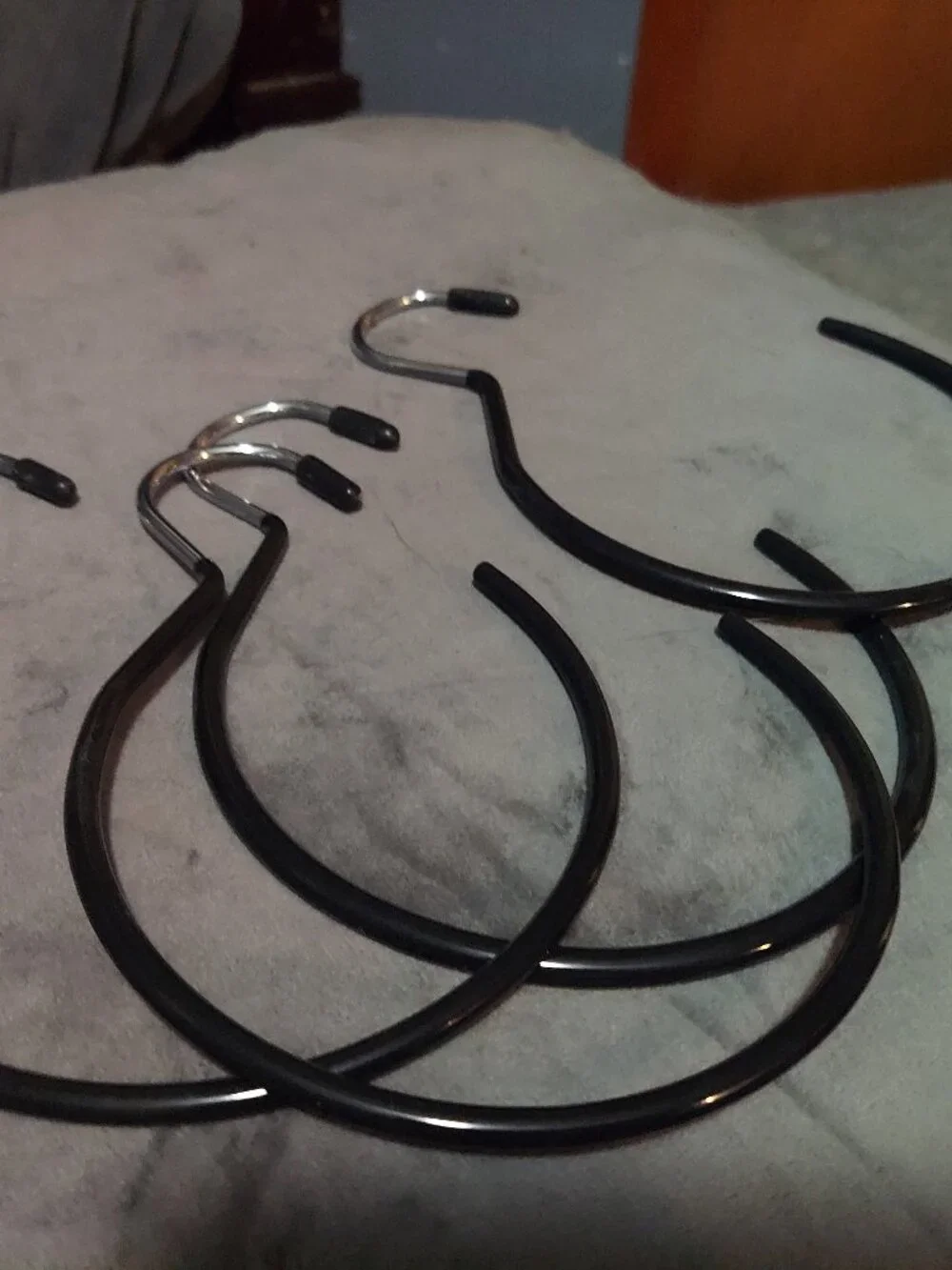 Hangers for belts, scarves, purses